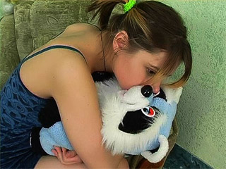Teeny hugging bear